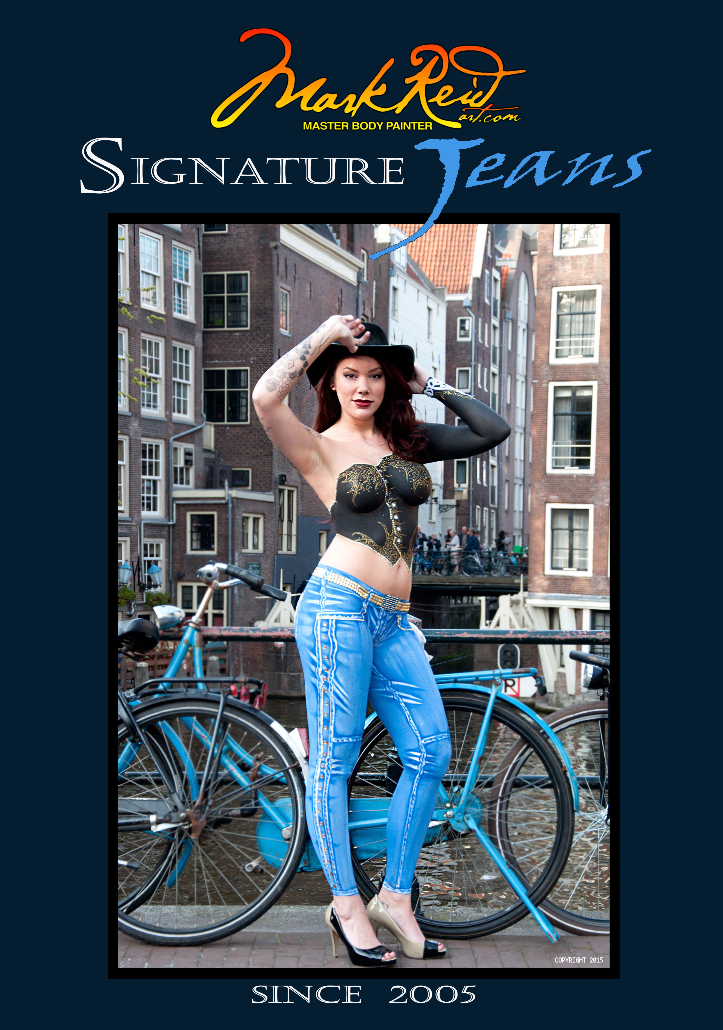 Book cover for Mark Reid Signature Jeans. It features a dark haired woman with a black corset and detailed jeans painted on her in front of some bikes and buildings